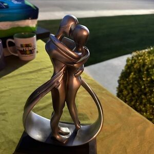 Elegant Silver Embrace Sculpture